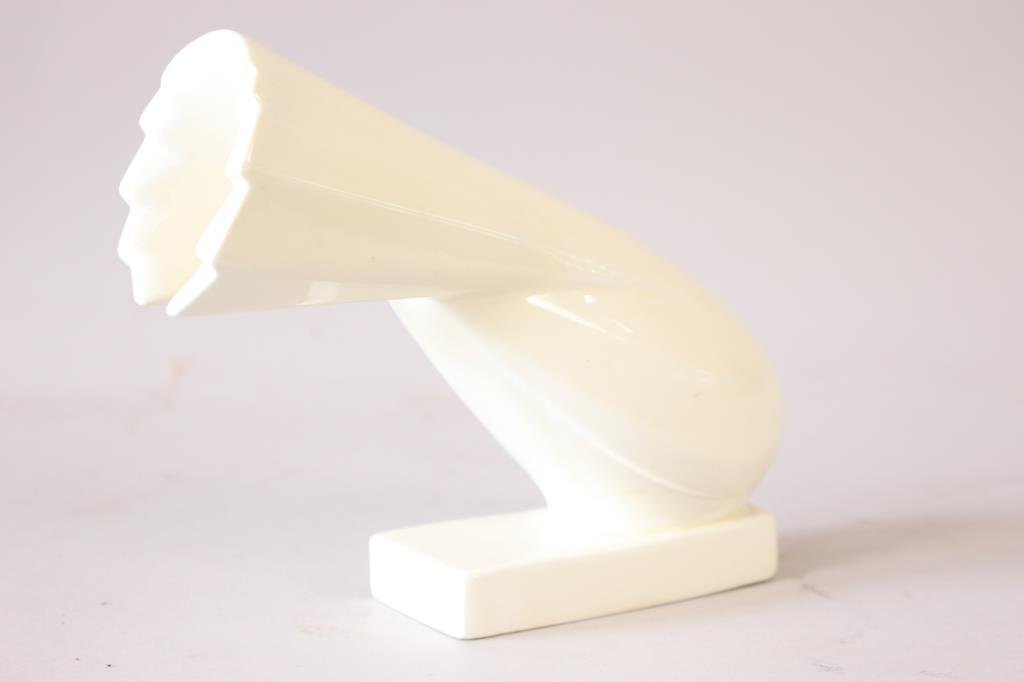 JACQUES ADNET WHITE PORCELAIN BIRD SCULPTURE: Art-Deco-style sculpture of a dove by Jacques Adnet (1901-1984), porcelain, France, 1940s; marked on base "Adnet" Dimensions: L 9" x W 2 1/8" x H 7" Condition: very good