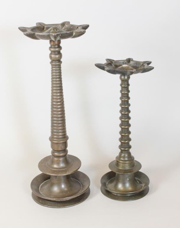 TWO 19TH CENTURY MIDDLE EASTERN OIL LAMPS: Two bronze oil lamps Dimension: Tallest: H 16" X Dia.6" Small: H 12 1/2' X Dia.5" Condition: excellent, beautiful patina