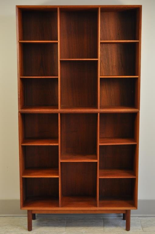 PETER HVIDT & ORLA MOLGAARD-NIELSEN BOOKCASE: With John Stuart tag to back, solid teak bookcase with removable base, a second bookcase stacked on top. Dovetail joinery. Dimensions: L 35 1/2" x W 11" x H 67" Condition: very good condition, some li