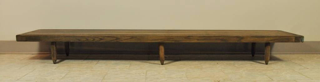 LOW SLAT BENCH ATTRIBUTED TO YASHA HEIFETZ: Said by the family to of been designed for them by their father Yasha Heifetz Dimension: L 99" X W 17" X H 11" Condition: Normal wear. Provenance: From the estate of Paul Heifetz, son of Yasha Heifetz