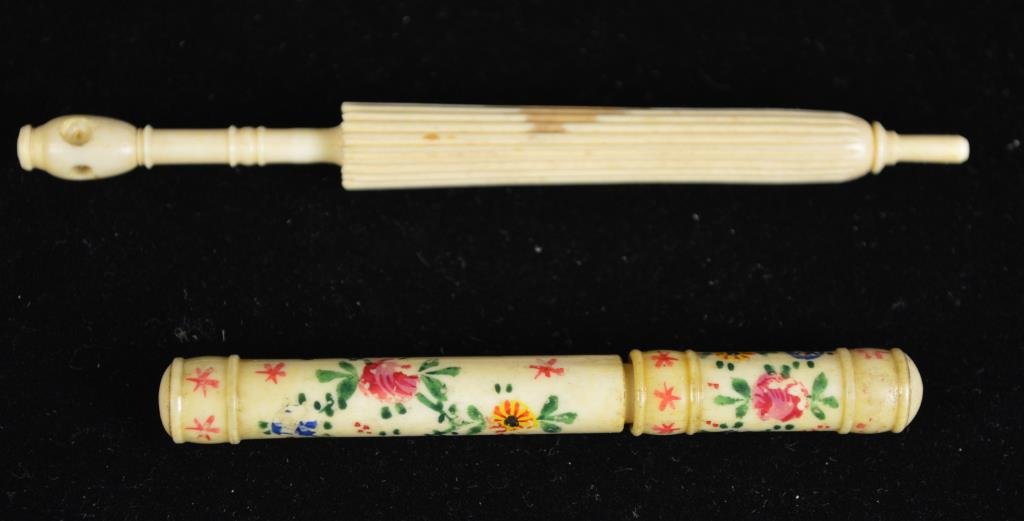 TWO ANTIQUE VICTORIAN IVORY & BONE NEEDLE CASES: Hand painted and carved umbrella shaped. Dimension: Umbrella: 5" Hand painted: 3.75" Condition: Good, working. One dark stain on umbrella shaped case Provenance: From the Estate Antique collection of