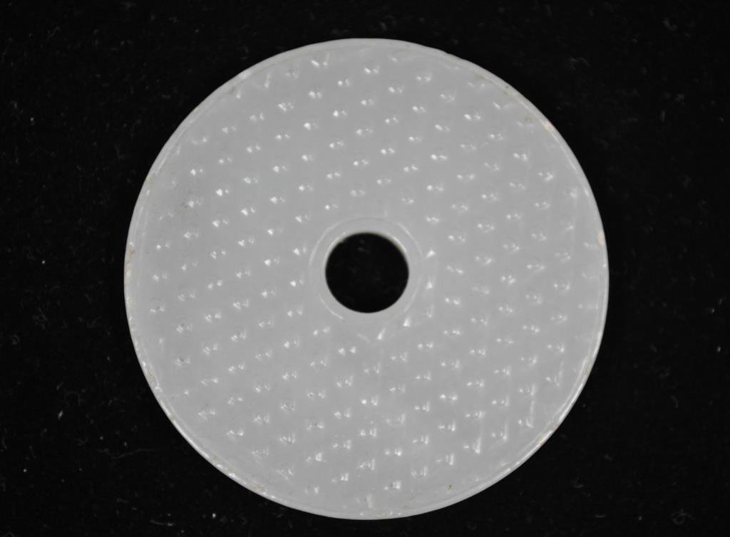 QING DYNASTY CARVED JADE BI-DISC PLAQUE 4: With dimpling to both sides Dimensions: Diameter 2 1/4" x W 1/4" Condition: light wear to edge rim Provenance: From the Estate Antique collection of Arthur + Joe Robinson