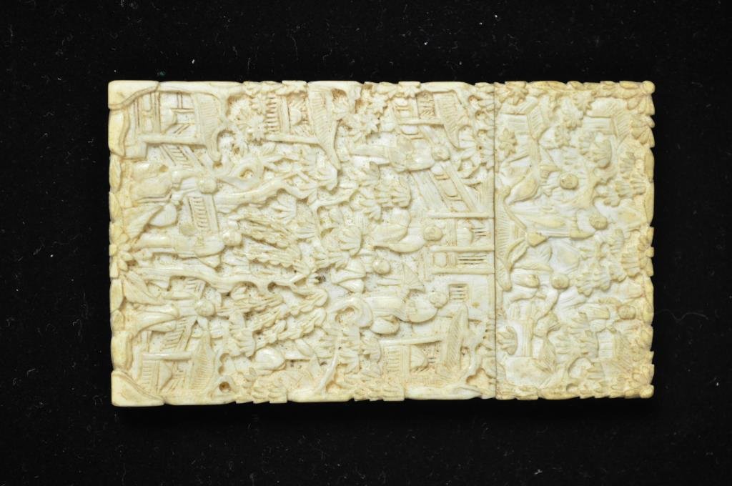 CARVED IVORY CARD CASE 1: Fully carved body Dimensions: L 3 3/4" x W 2 1/4" x H 1/4" Condition: one small puncture to case Provenance: From the Estate Antique collection of Arthur + Joe Robinson
