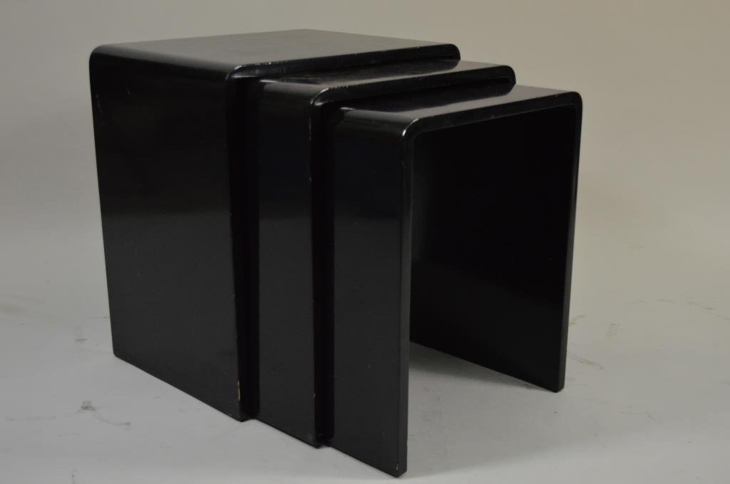 LAQUERED NESTING SIDE TABLES: Black lacquer, unmarked Dimensions (largest): L 20" x W 14" x H 22" Condition: various gashes to wood, paint loss and scratches to lacquer Provenance: From the estate of Designer Stanley Hura.