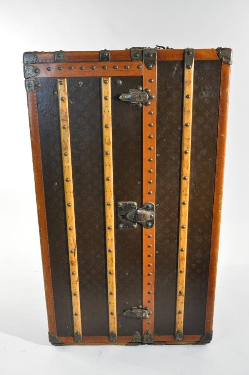 LOUIS VUITTON WARDROBE TRUNK: Dimensions: 26" X 44" X 22" Condition: some wear to leather and pattern from use, leather interior handles have split, old wear to wood, overall in fine vintage condition