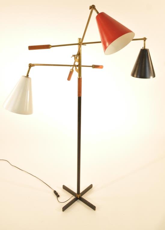 EARLY ARREDOLUCE TRIENNALE FLOOR LAMP: Stamped "Made in Italy' to brass stem, with leather handles. Measurements: 57.5" H X 44" W is adjustable Condition: Good Condition, minor paint chips to base and there is one missing socket. Red shade