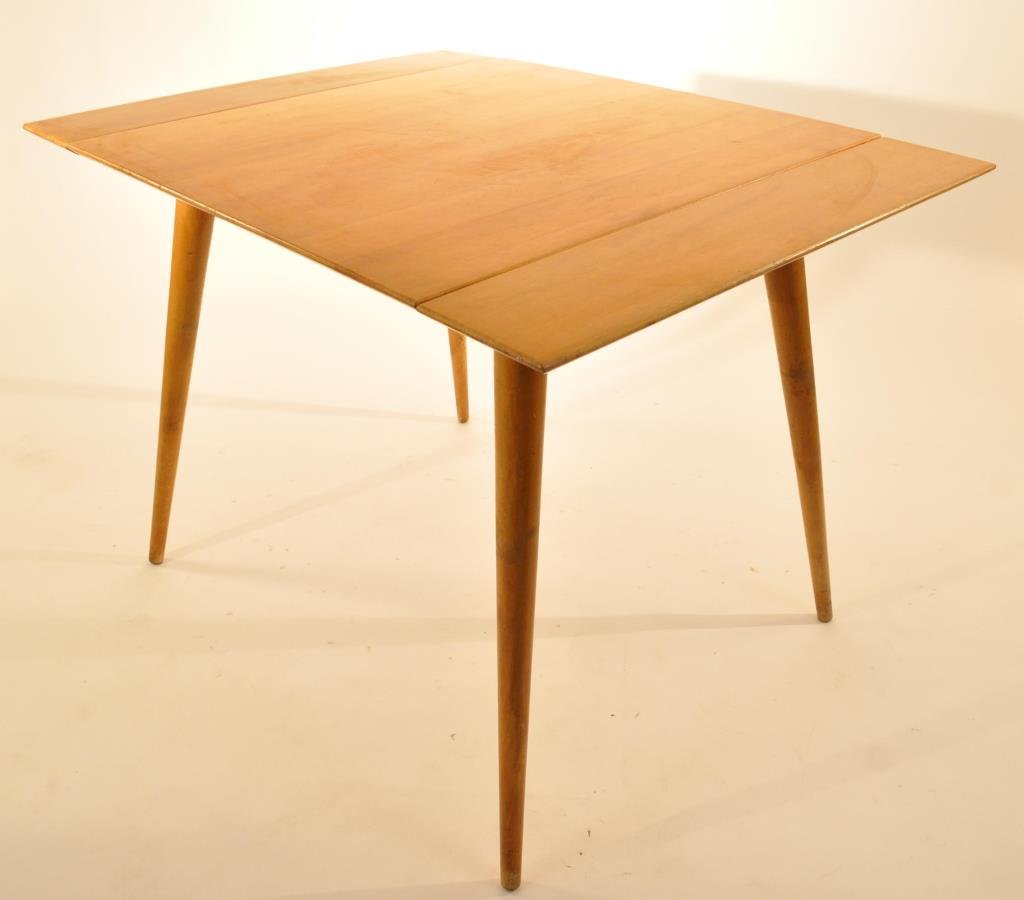 PAUL MCCOBB PLANNER GROUP TABLE: Dimensions: 29" H X 40.5" L X 30" W Condition: some surface scratching and nicks from use, otherwise good condition