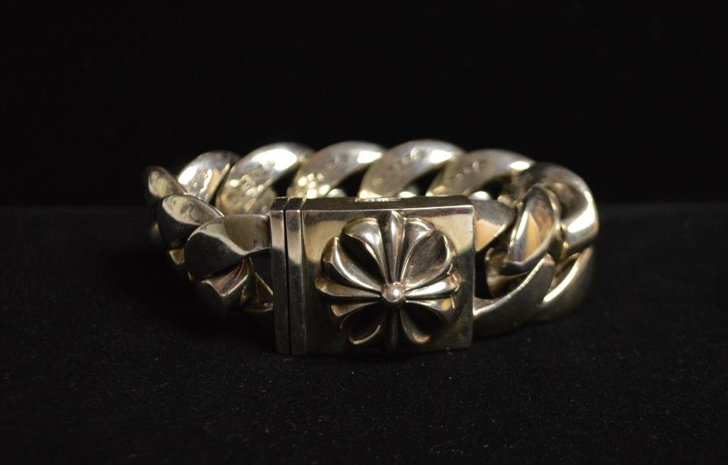 CHROME HEARTS STERLING SILVER CHAIN LINK BRACELET: C. 2004 comes with dust bag and Bergdorf Goodman jewelry box as well as cardboard outer box. VERY CHUNKY AND HEAVY! Total weight: 16.110 ozt Dimension: 1 1/4" wide Condition: Good, used. Only light su