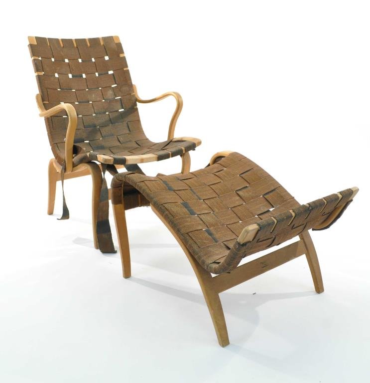 BRUNO MATHSSON "EVA" CHAIR AND OTTOMAN: Marked Firma Karl Mathsson, 1967 to bottom of chair, ottoman is from another Mathsson design Dimensions (chair): L 23 1/2" x W 26" x H 23" Condition: sturdy, some surface scratching and loss of finish