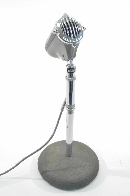 TWO VINTAGE ASTATIC MICORPHONES: ASTATIC CORP MICROPHONE MODEL # DM-HZ Measurements: 13.5" H X Diameter 6" Condition: minor scuffs, untested does have cord attached Astatic Model # D-104 Dimensions: 6" Diameter x 11" H Condition: goo