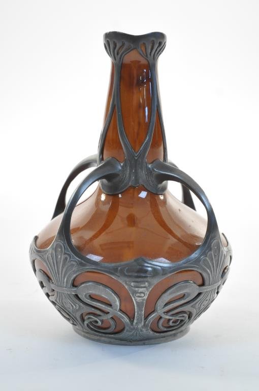 OSIRIS ART NOUVEAU VASE POSSIBLY BY MAX LAUGER: OSIRIS ART NOUVEAU Pewter & Pottery Vase Pottery has a glaze similar to many Max Läuger vases Pewter inlay with glaze pottery, stamped on the bottom OSIRIS 575. Dimensions: 10" H X 7" Widest Diameter