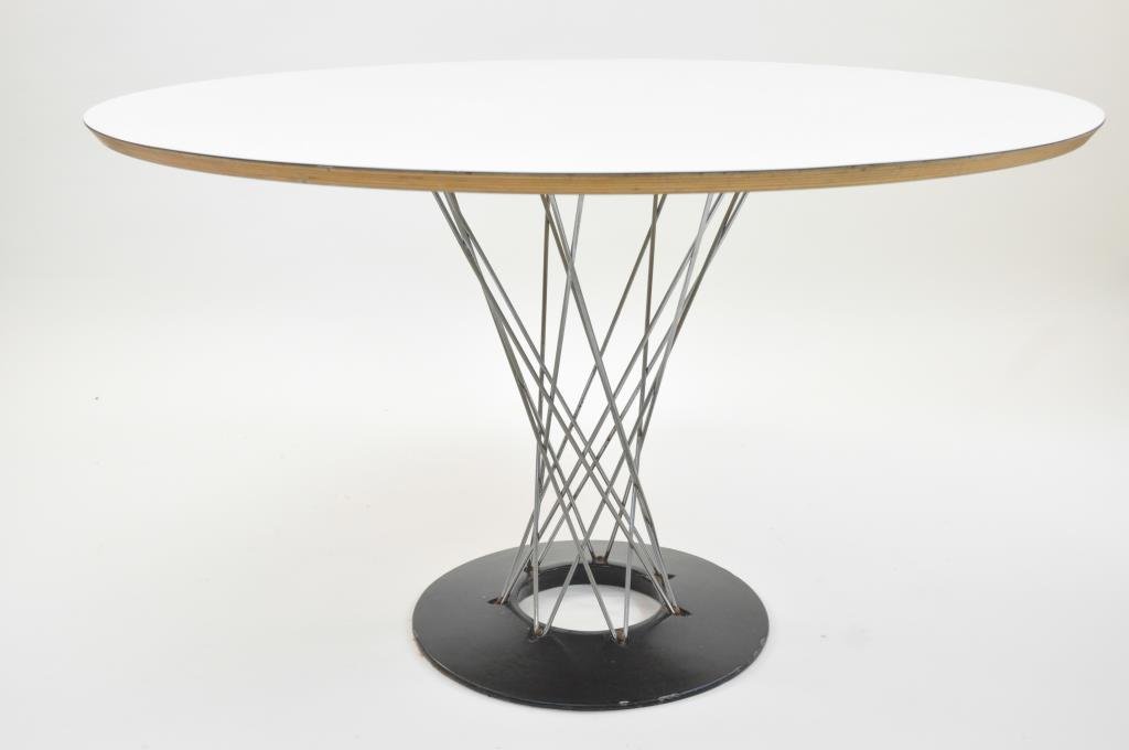 ISAMU NOGUCHI CYCLONE TABLE: For Knoll Associates, ca 1950s Dimensions: 47.5" Diameter X 28.5" H Condition: Pitting and light rust to chrome, loss of enamel to base, some surface scratches to top and loss of veneer to bottom of t