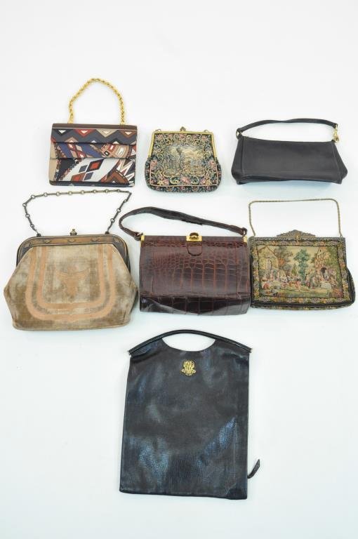 GROUPING OF VINTAGE COUTURE HANDBAGS: English Needlework bag, leather Coach clutch, unmarked Gatorskin bag, Ria Viale Parisian leather bag, Fanny Skakan Viennese needlework bag with Marcasite inlaid handle, an early Roberta di Camerino cu