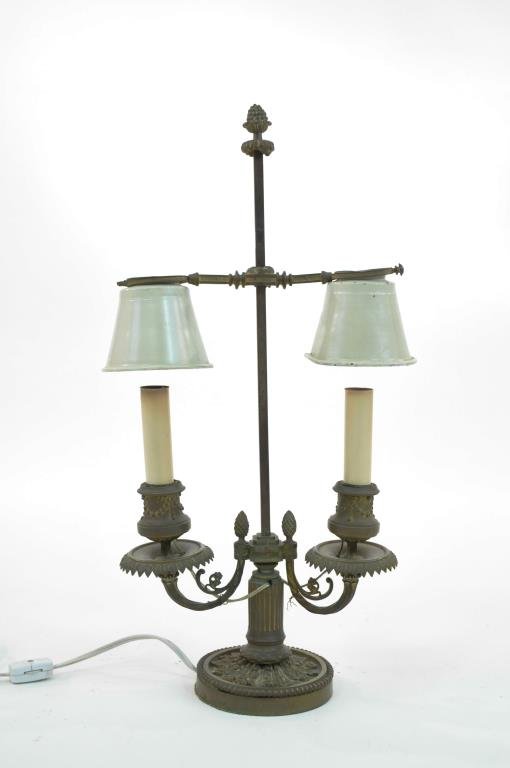 FRENCH BOUILLOTTE TABLE LAMP: Bronze & gold gilt design candleholder lamp. Fitted for electricity. Condition: Gilt finish is worn overall. Dimensions: H 19" x W 9" x D 4 1/2"