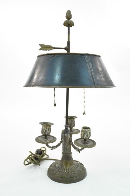 FRENCH BOUILLOTTE TABLE LAMP WITH GREEN SHADE: Bronze & gold gilt design three candleholder lamp. Fitted for electricity. Dimensions: H 21" x Diameter 12" Condition: Gilt finish is worn overall. has paint loss inside of the shade.