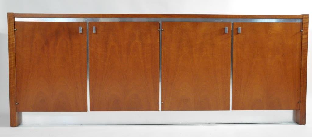 FOUNDERS KNOLL MODERN SIDEBOARD: Of polished aluminum and mahogany veneer Dimensions: H 29 1/2" x W 77 1/2" x D 18" Condition: very good, little wear to wood, some surface wear to aluminum at contact points with doors