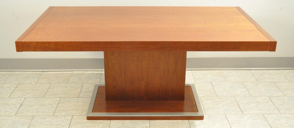 FOUNDERS KNOLL MODERN DINING TABLE: Of polished aluminum and mahogany veneer Dimensions: H 28 3/4" x W 68" x D 38" Condition: extremely light surface scratching to top, some wear to aluminum at base