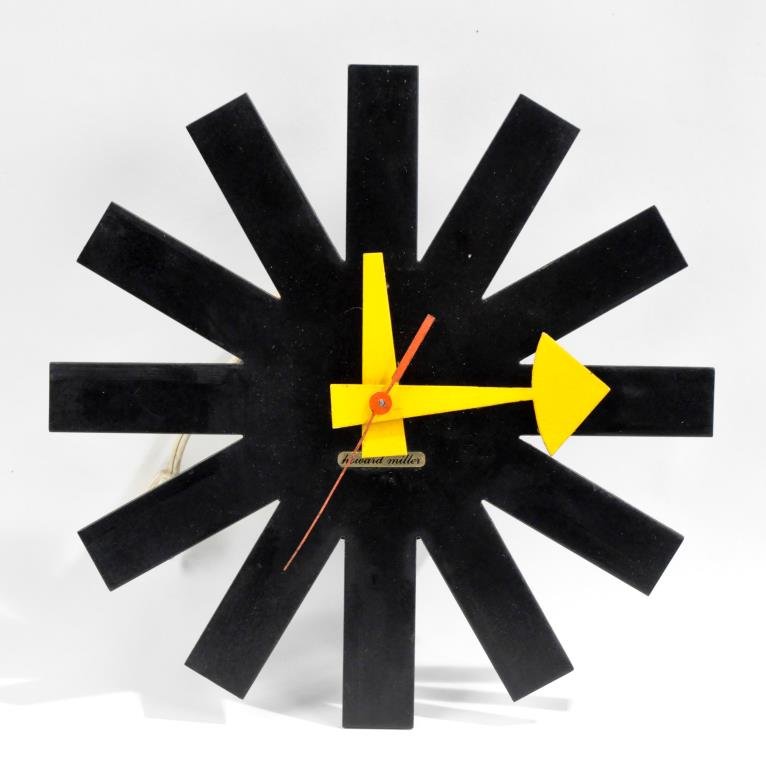 GEORGE NELSON ASTERISK CLOCK: For Howard Miller, with label to front, untested Dimensions: Diameter 10" x Depth 3" Condition: good, seems to be missing cap on hands, second hand is slightly bent