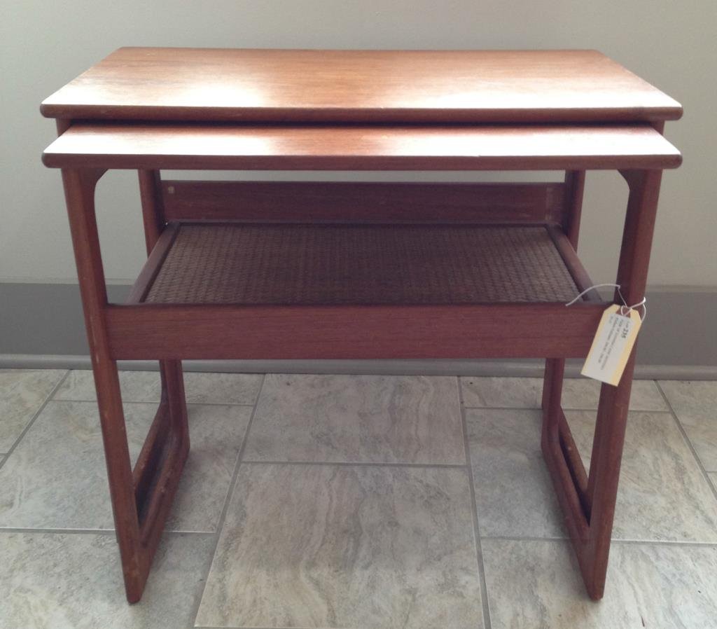 PAIR OF DANISH CANE NESTING TABLES: Sticker reads: "Silkeborg CFC" Dimension: H 20" X W 23" X D 13 1/2" Condition: good, small veneer chip to top of smaller table, some staining