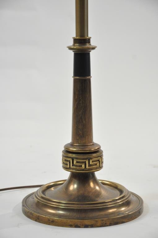 JAMES MONT STYLE ORIENTAL MOTIF BRASS LAMP: With white shade Dimensions: H 52" x Diameter 9 1/2" Condition: very good, untested