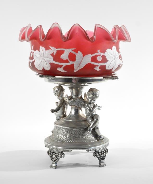 AMERICAN SILVER PLATE CAMEO GLASS FIGURAL COMPOTE: With Meridian silverplate base Dimensions: H 12" x Diameter 10" Condition: good, some light surface scratching Provenance: Arthur and Joe Robinson Collection, Harrison, New York.