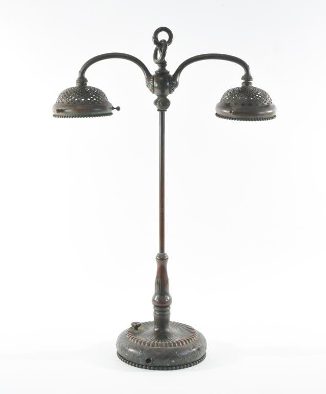 LOUIS COMFORT TIFFANY DOUBLE STUDENT TABLE LAMP: Bronze base, incised to bottom "28600 Tiffany Studios New YorkDimensions: H 26" x W 18" x D 7.5"Condition: overall good, without wiring or shades, missing two shade screws