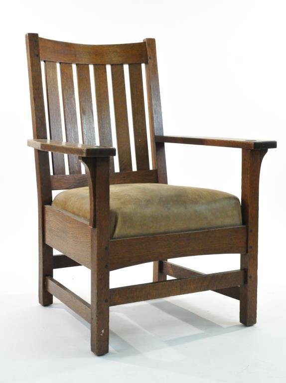 L. & J.G. STICKLEY ARTS AND CRAFTS ARMCHAIR: Dimensions: H 39" x W 28" x D 30"Condition: good, wear to leather seat, small claw marks to back of seat