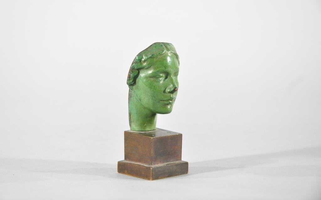 VICTOR SALVATORE (ITALIAN / AMERICAN 1885-1965): MASK OF A WOMAN, 1922, Green patinated bronze, and foundry mark R.B.W. for the Roman Bronze Works.Dimensions: H 4" X W 1.5" X D 1.5"Condition: some of it green patina loss.