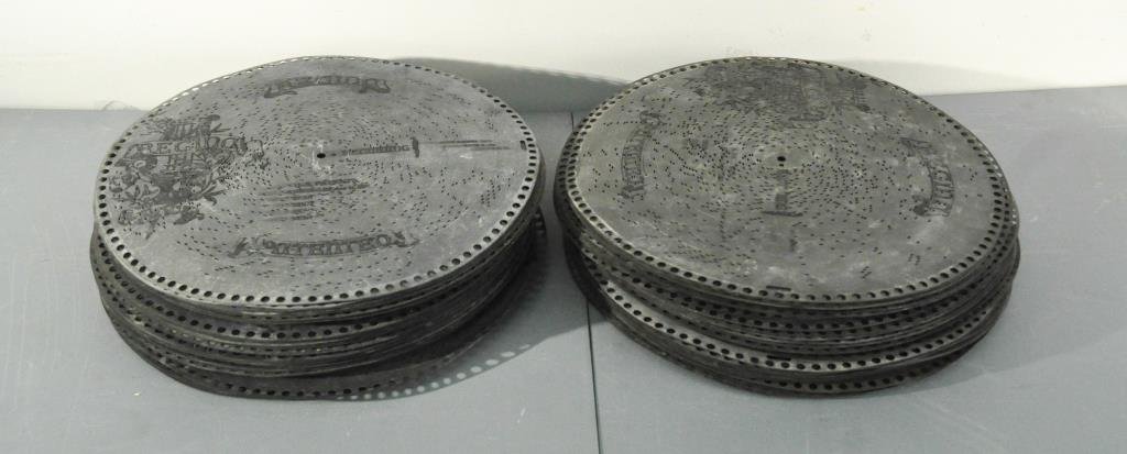 100+ REGINA MUSIC PLAYER 15.5" DISCS: Includes over 100 disks including: Katy Mahone, Arthur Sullivan, Gumbert etc.Dimensions: D 15.5"Condition: Good, played.