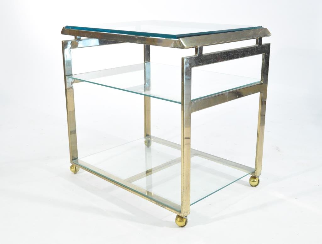 MID-CENTURY BRASS & GLASS BAR CART: Brass plated.Dimensions: H 27.25" x W 28" x D 20"Condition: Oxidation and loss to plate.