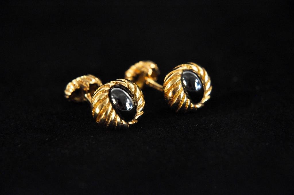 TIFFANY & CO SCHLUMBERGER 18K & HEMATITE CUFFLINKS: 18K Yellow gold with hematite stones. Dimensions: L 1"Total Weight: 12.1 dwtCondition: Very good.