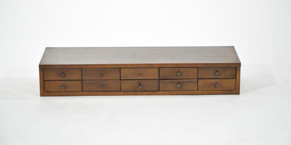 PAUL MCCOBB JEWELRY CHEST: Dresser top with 10 drawers. Dimensions: H 6" x W 36" x D 12.25"Condition: Good, very slight loss to finish on top, missing knobs.