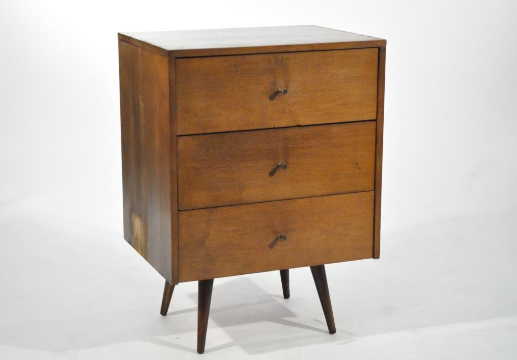 PAUL MCCOBB MID-CENTURY 3 DRAWER CHEST: 3 drawer with original label.Dimensions: H 33.25" x W 24" x D 18.25"Condition: Sun staining to right side, crack to left side and top, surface scratching and small chips.