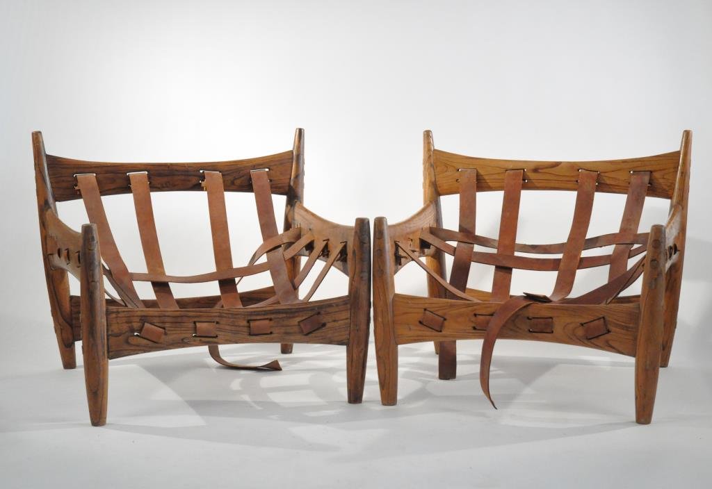 SERGIO RODRIGUES JACARANDA SHERIFF OR MOLE CHAIRS: Dimensions: H 30" X W 34.75" X D 31"Condition: Leather straps need repair, slight water staining, some paint marks.