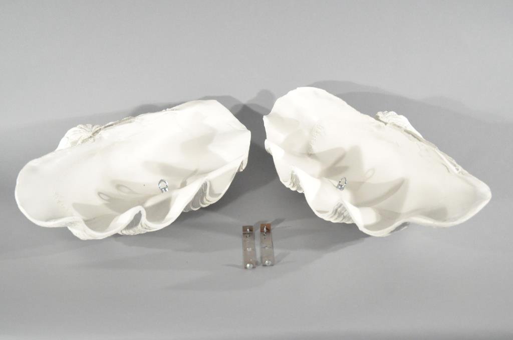 TWO PLASTER SEASHELLS: Plaster molds of seashells, could be turned into sconces. Dimensions: H 7" x W 23" x D 13"Condition: Good.