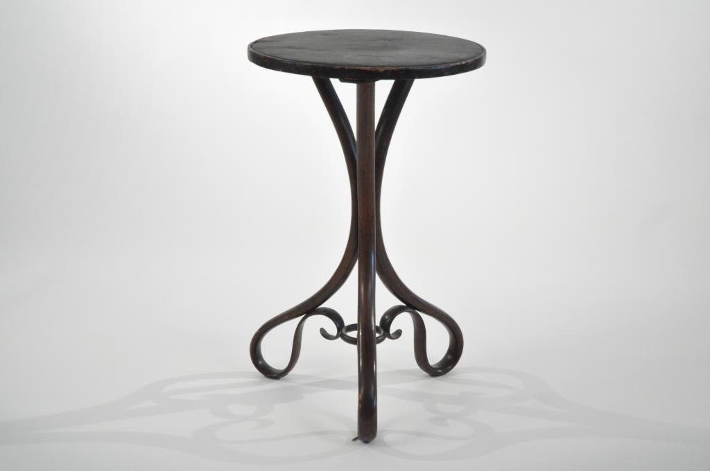 19TH C. THONET BENTWOOD TABLE STAND: Hardened leather top, old label to bottom reads to United States Depot. Dimensions: H 31" X D 19.5"Condition: Good, some losses to edges from use.