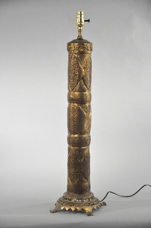 1920S SYRIAN PIERCED BRASS TABLE LAMP: Lights up insideDimensions: H 26.5" x D 10"Condition: One crack and dent, needs rewiring.