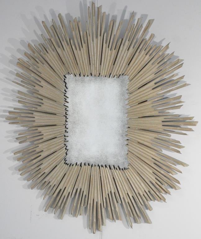 FAUX-WOOD SUNBURST MIRROR: With an antique speckled and beveled mirrorDimensions: H 46" x W 40" Condition: good