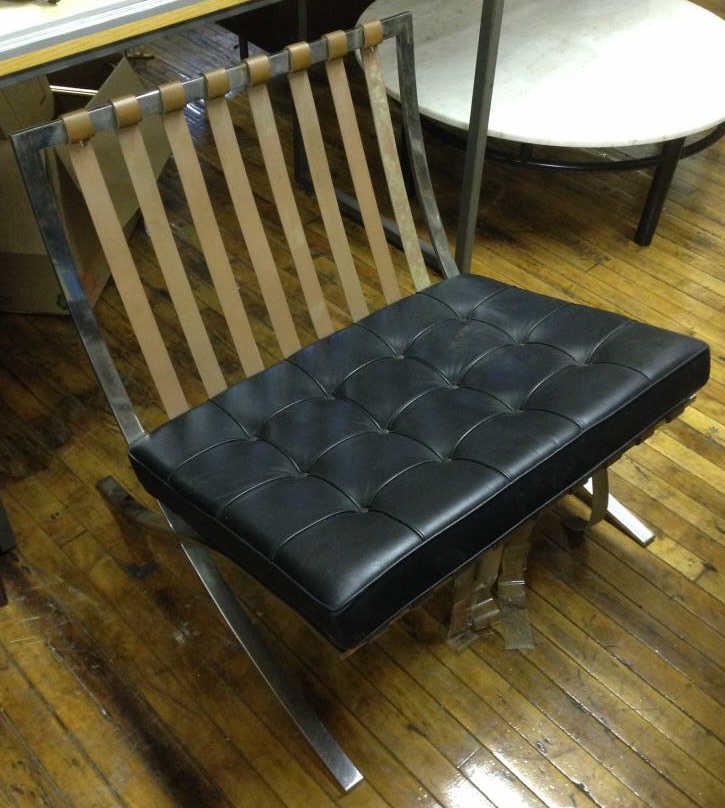KNOLL BARCELONA CHAIR: Dimensions: H 30" x W 29.5" x D 30"Condition: as is, chrome is in decent shape, needs to be restrapped, and needs new back and cushionONSITE WAREHOUSE AUCTION, ITEMS MUST BE PICKED UP WITHIN 7 DAYS AF