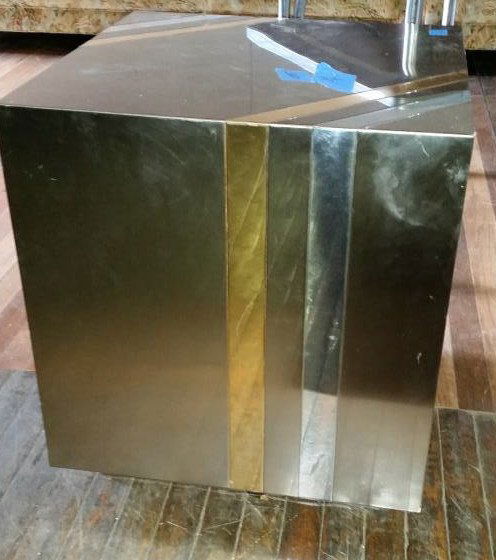PAUL EVANS METAL CLAD CUBE TABLE: Dimensions: H 22" x W 20.25" x D 20.25"Condition: goodONSITE WAREHOUSE AUCTION, ITEMS MUST BE PICKED UP WITHIN 7 DAYS AFTER THE AUCTION, ALL ITEMS LEFT PAST THAT DAY WILL BE ABANDONED