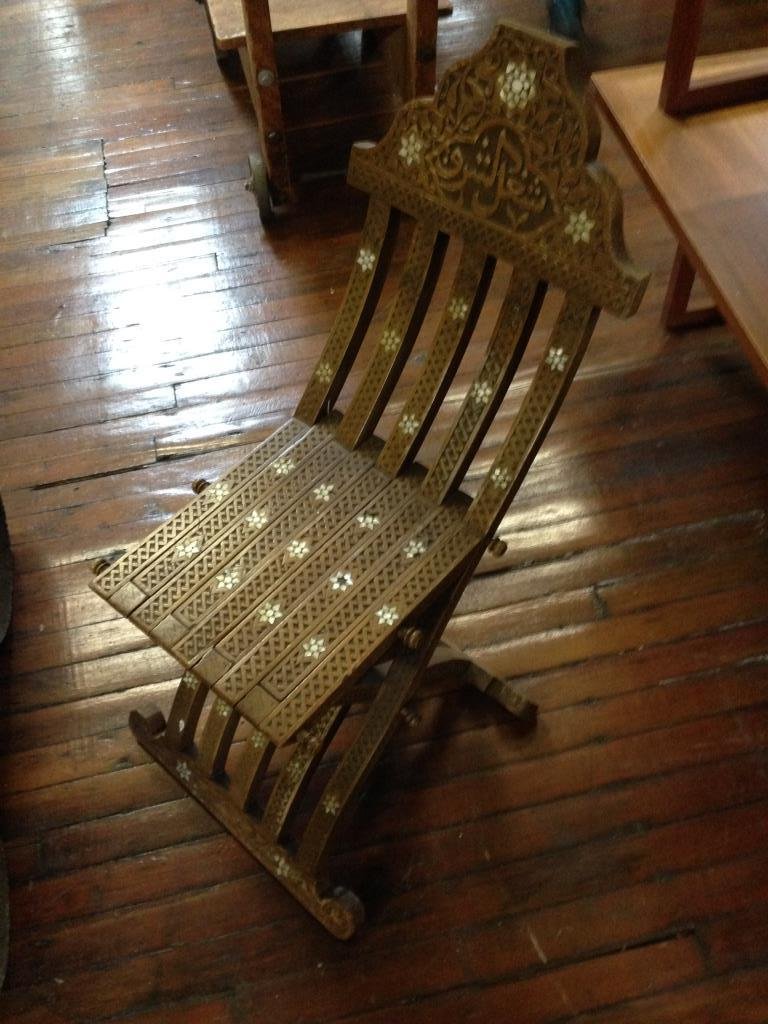 DAMASCUS SYRIAN INLAID FOLDING CHAIR: Dimensions: H 34" x W 18" x D 20"Condition: fairONSITE WAREHOUSE AUCTION, ITEMS MUST BE PICKED UP WITHIN 7 DAYS AFTER THE AUCTION, ALL ITEMS LEFT PAST THAT DAY WILL BE ABANDONED