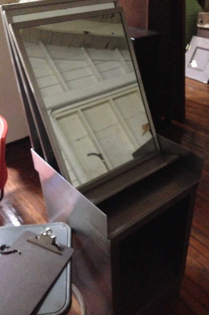 STAINLESS STEEL FRAME MIRRORS AND TABLE: Dimensions: Cabinet: H 33.75" x W 18.5" x D 20" Mirror: H 24.75" x W 18" x D 5"Condition: goodONSITE WAREHOUSE AUCTION, ITEMS MUST BE PICKED UP WITHIN 7 DAYS AFTER THE AUCTION, ALL ITEMS LEFT PAST THA