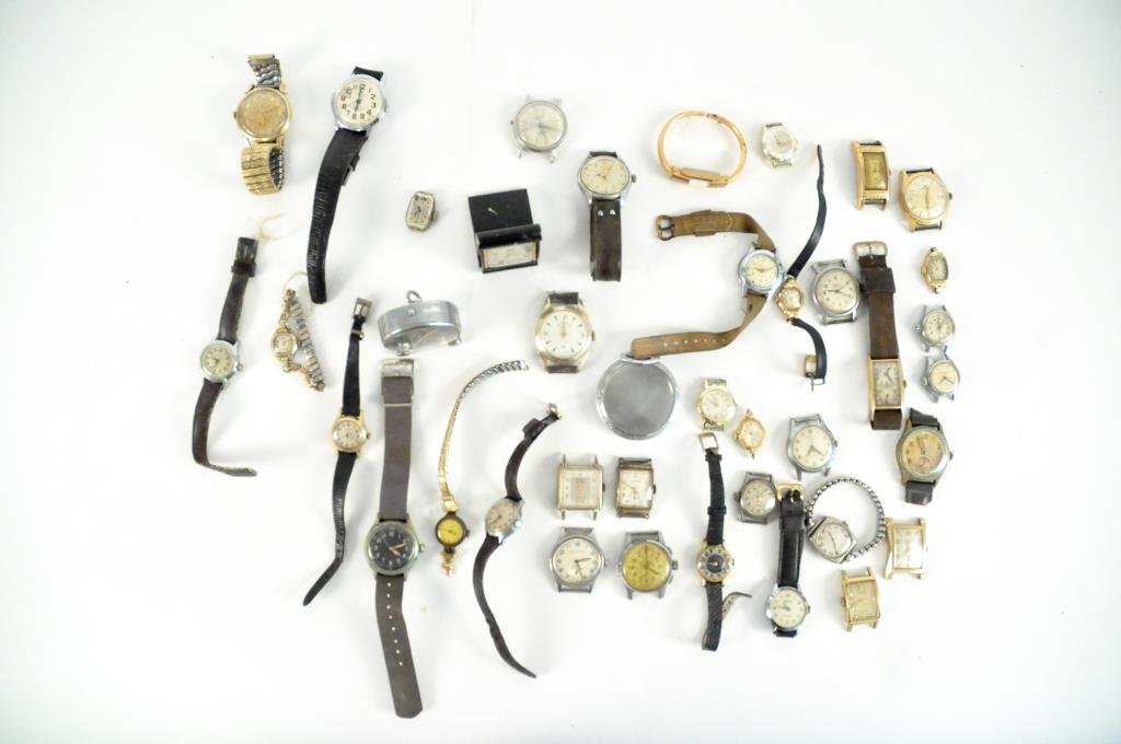LARGE GROUPING OF VINTAGE AND ANTIQUE WATCHES: 40 pieces Including: Lipton (Rolex) Serial number 723397 with stop watch(winds but doesnt run), Elgin Type A-11 WW11 watch, Tourneau, Royce Sterling & 10k RGP, Hamilton Deco Gold Filled, Cyma GF, Wakm
