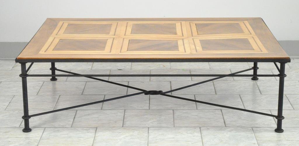 PARQUET WOOD & IRON COFFEE TABLE: Dimensions: H 18" x W 42.75" x D 60"Condition: Good, top has some raised areas.