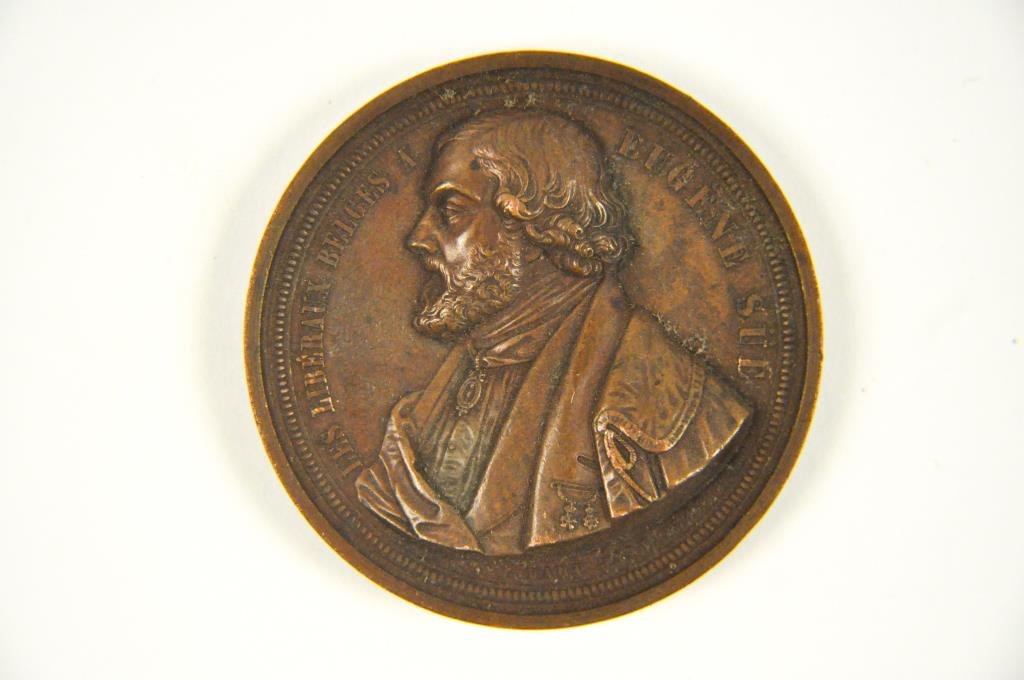 LES LIBERAUX BELGES A EUGENE SUE MEDAL: Signed Hart Janv. 1845. Inscribed Sa plume foudroie l'hydre qui brava Rome et les rois. Bulle de Clement XIV 1778. Edit de Louis XV 1764. Edit de Marie-Therese 1773. La Juif Errant 1844. Dimensions: d