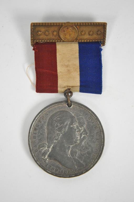 WASHINGTON/HARRISON INAUGURAL CENTENNIAL MEDAL: white metal with ribbon. Washington. Harrison. 1789-1889. Centennial of the inauguration of George Washington as first president of the united states. New York. April 30, 1789.Dimensions: dia 1.5"Cond