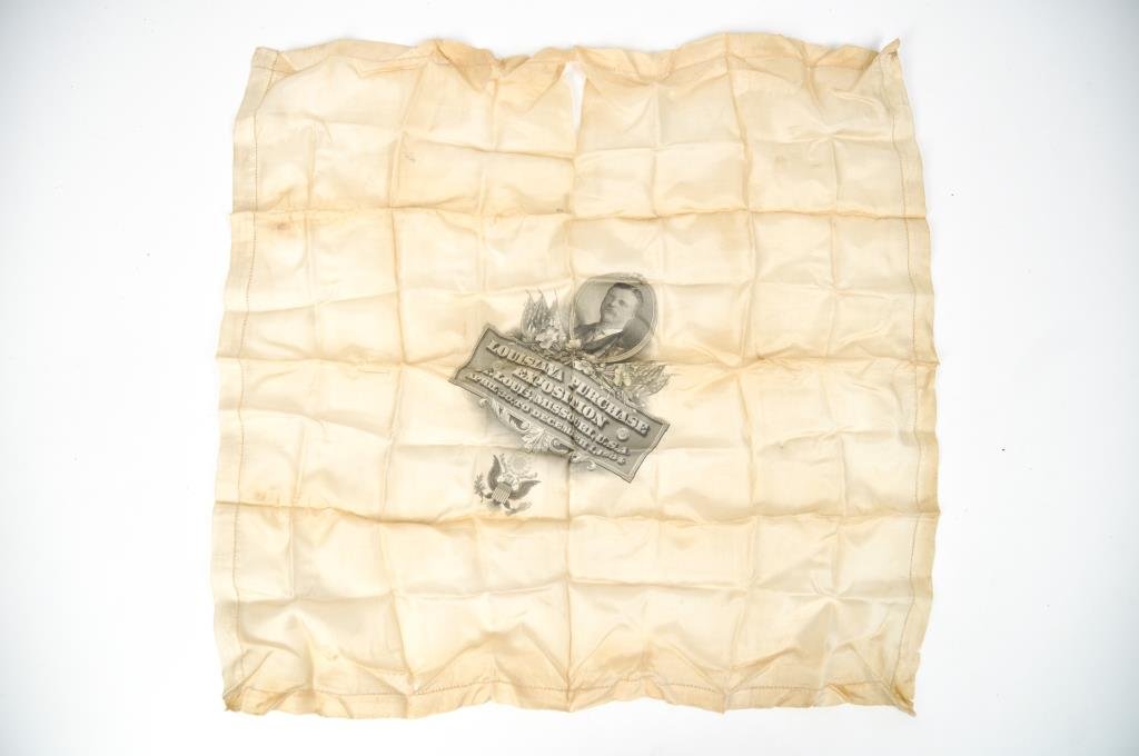 TEDDY ROOSEVELT 1904 LA PURCHASE HANDKERCHIEF: From the Louisiana Purchase Exposition, St. Louis Missouri, April 30 to December 1, 1904Dimensions: H 16.5" x W 17"Condition: tears to fabric