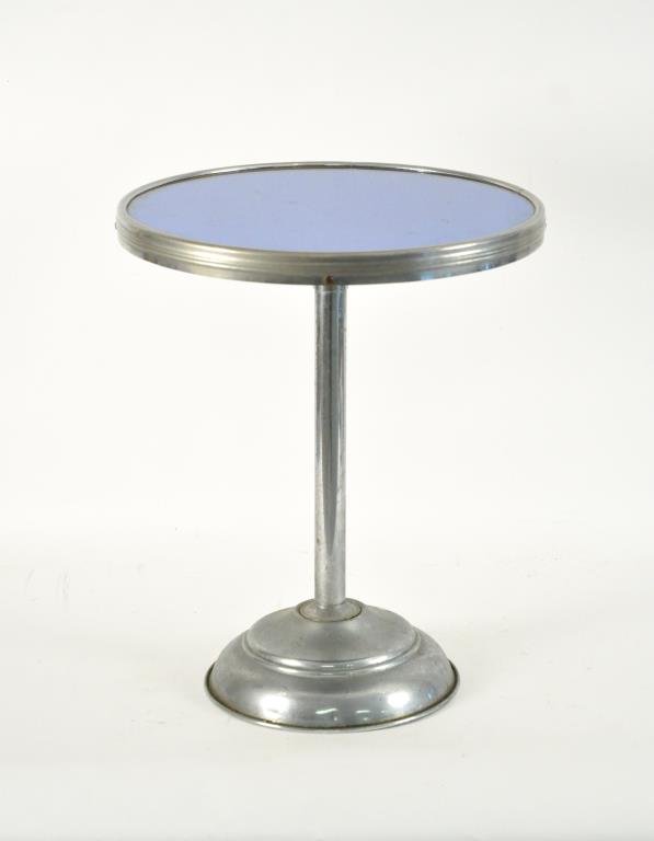 ART DECO NICKEL PLATED MIRROR TOP TABLE: Dimensions: H 20" x Diameter 16" Condition: Slightly wobbly, light scratching to top.