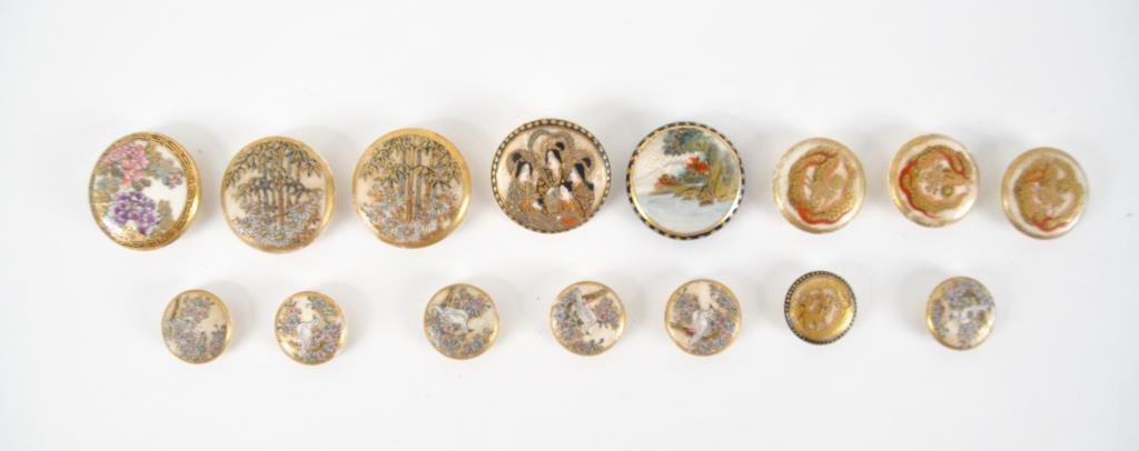 GROUPING OF PAINTED PORCELAIN BUTTONS: 15 Buttons, including a pair, 6 with birds, 3 with dragons, and 4 misc. Dimensions: (Largest) 1.25" Diameter Condition: good