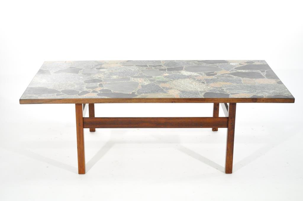 DANISH MID-CENTURY MOSAIC MARBLE COFFEE TABLE: Circa 1960s, Denmark, Coffee Table of rosewood, marble and brassDimensions: H 19" x W 29.5" x D 59"Condition: Nice selection of varied stones set into a thick concrete top. No breaks or repairs. Very